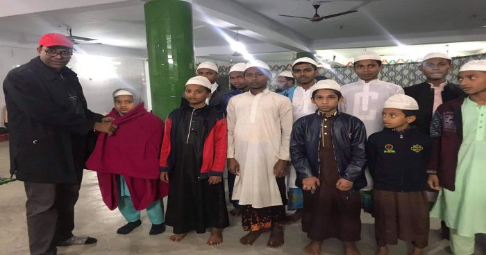 2020 Providing winter clothes to orphaned children in a madrasa