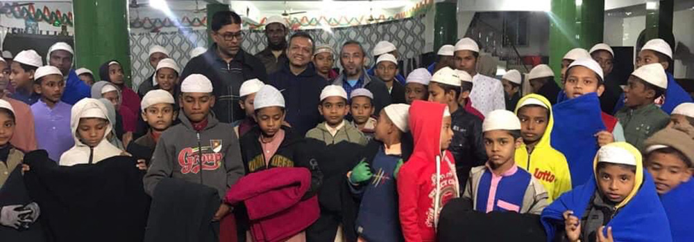 Distribution of winter clothes to orphans in orphanages